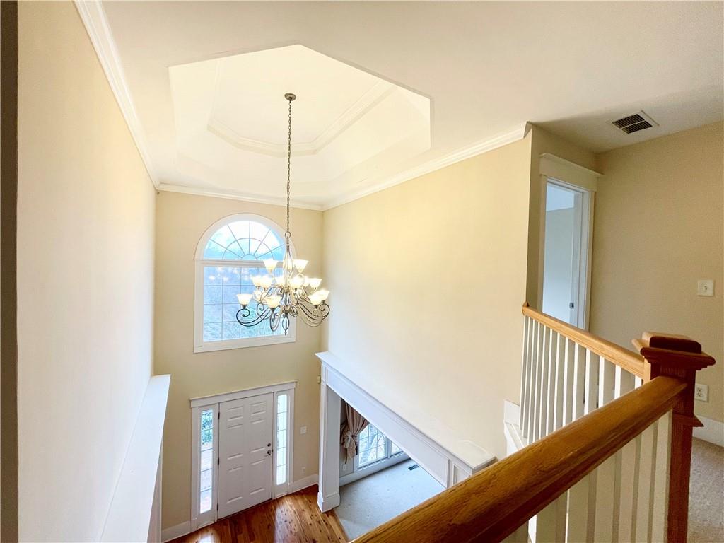 555 Vinings Springs Drive Southeast Mableton, GA 30126 - Photo 49 of 57 a view of a hallway view with wooden floor and stairs