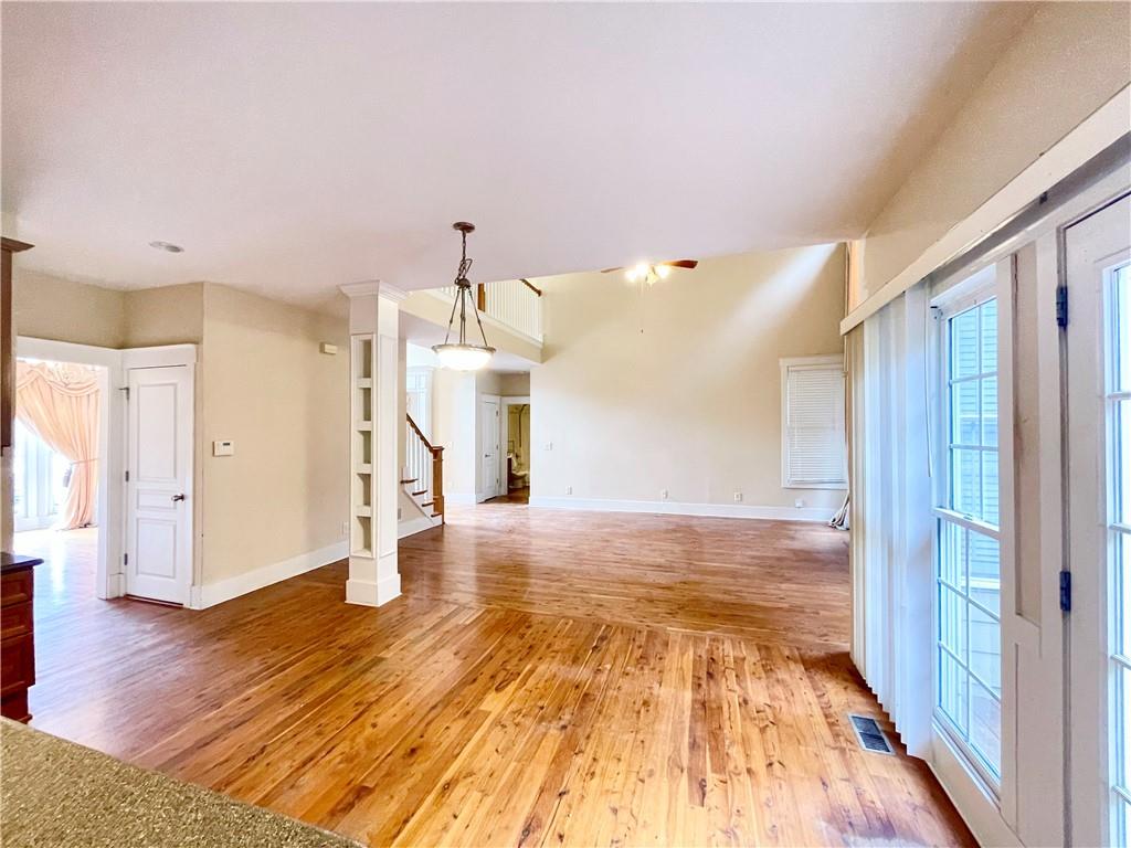 555 Vinings Springs Drive Southeast Mableton, GA 30126 - Photo 8 of 57 a view of empty room with wooden floor
