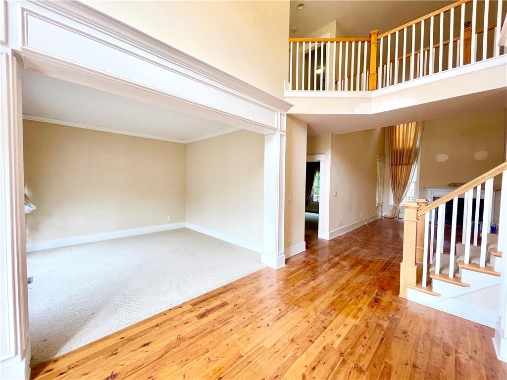 555 Vinings Springs Drive Southeast Mableton, GA 30126 - Photo 10 of 57 a view of a hallway with entryway and stairs