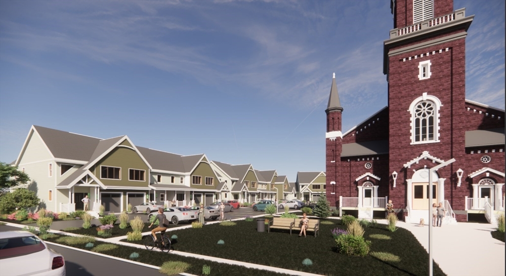 13 Elizabeth Lane, Unit 13 Easthampton, MA 01027 - Photo 1 of 18 a view of a town with many windows