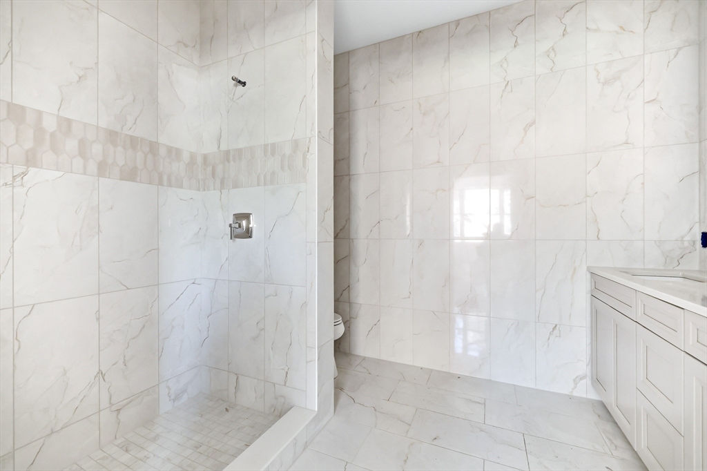 13 Elizabeth Lane, Unit 13 Easthampton, MA 01027 - Photo 12 of 26 a bathroom with a shower