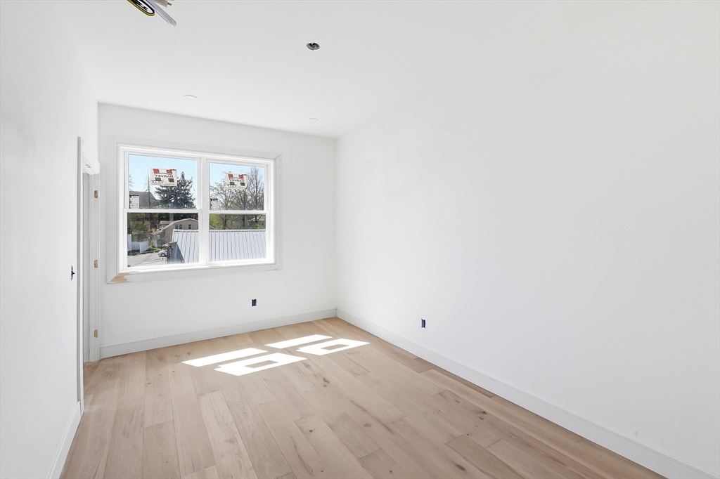 13 Elizabeth Lane, Unit 13 Easthampton, MA 01027 - Photo 14 of 26 a view of empty room with window