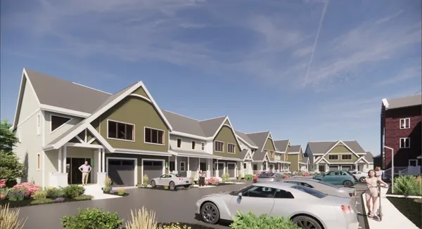 a front view of a residential houses with buildings