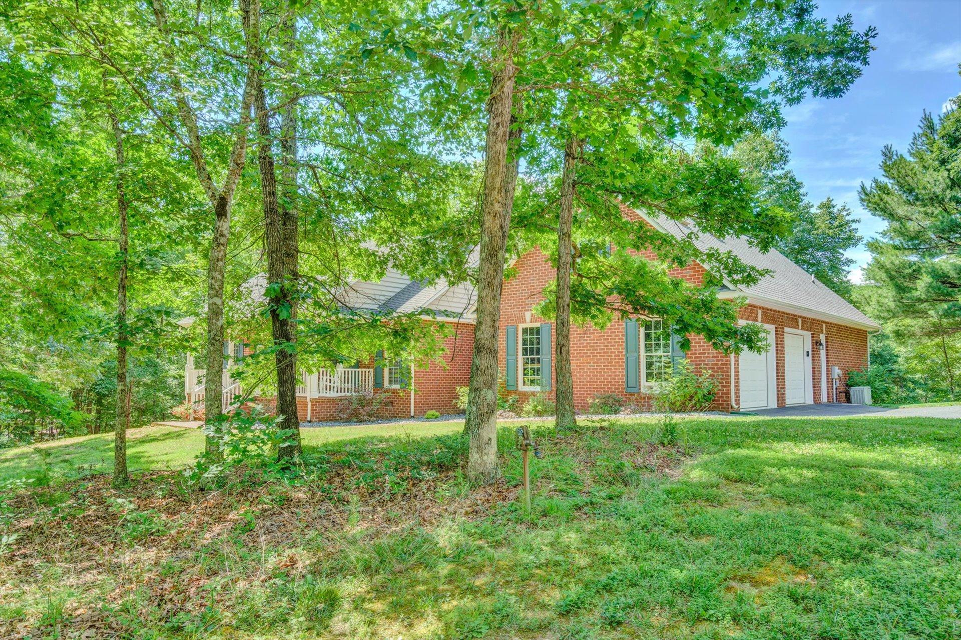 2795 New Ridge Road Elliston, VA 24087 - Photo 2 of 46 a backyard of a house with lots of green space