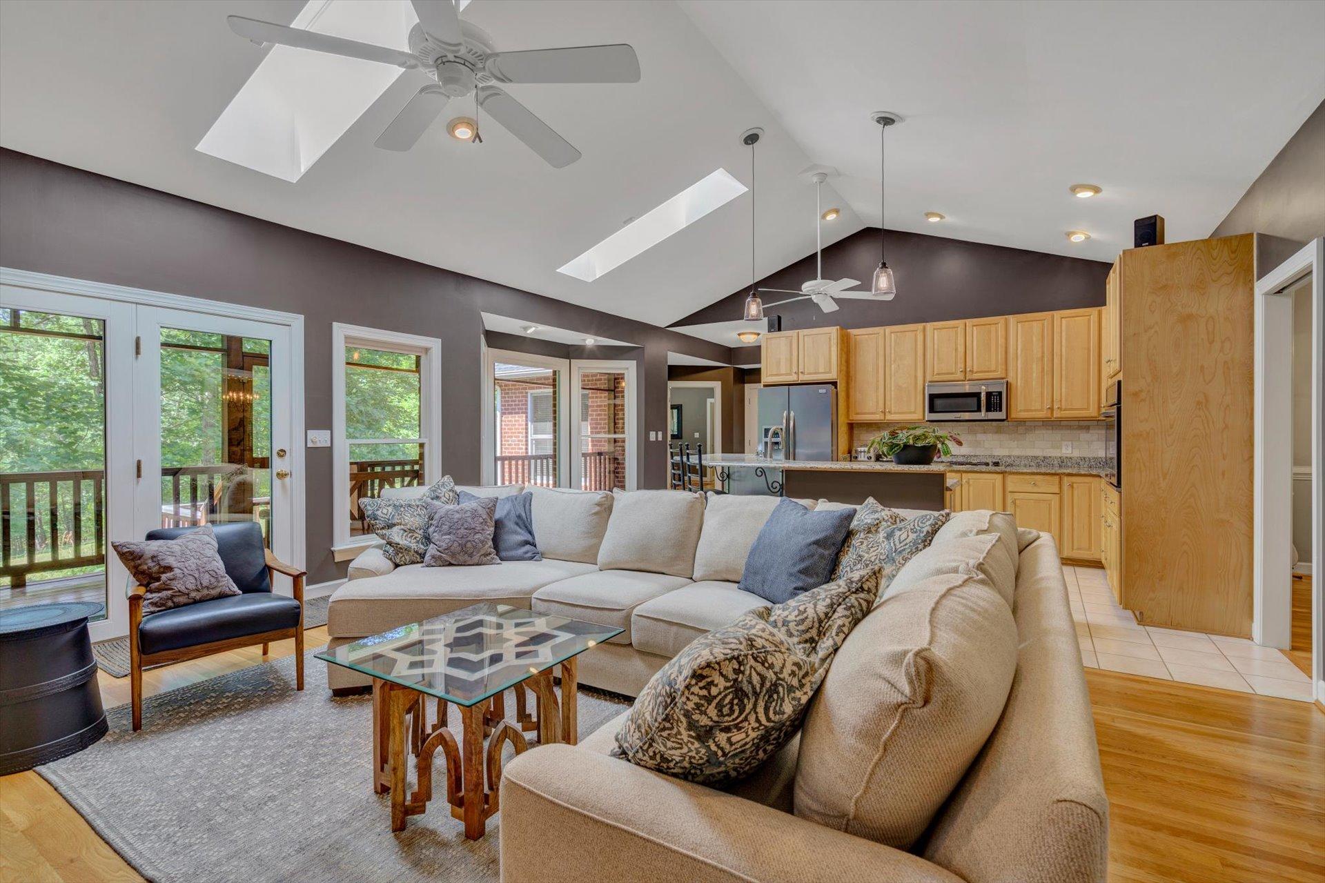 2795 New Ridge Road Elliston, VA 24087 - Photo 11 of 46 a living room with furniture and a large window