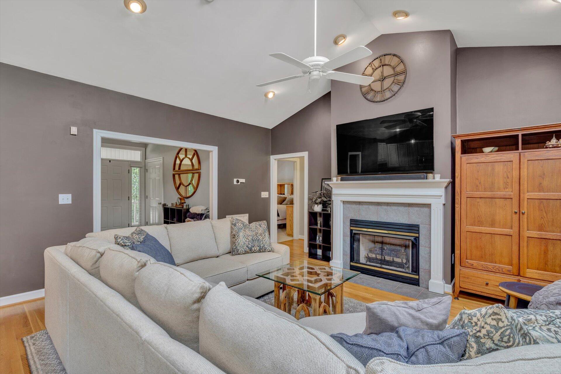 2795 New Ridge Road Elliston, VA 24087 - Photo 12 of 46 a living room with furniture a flat screen tv and a fireplace