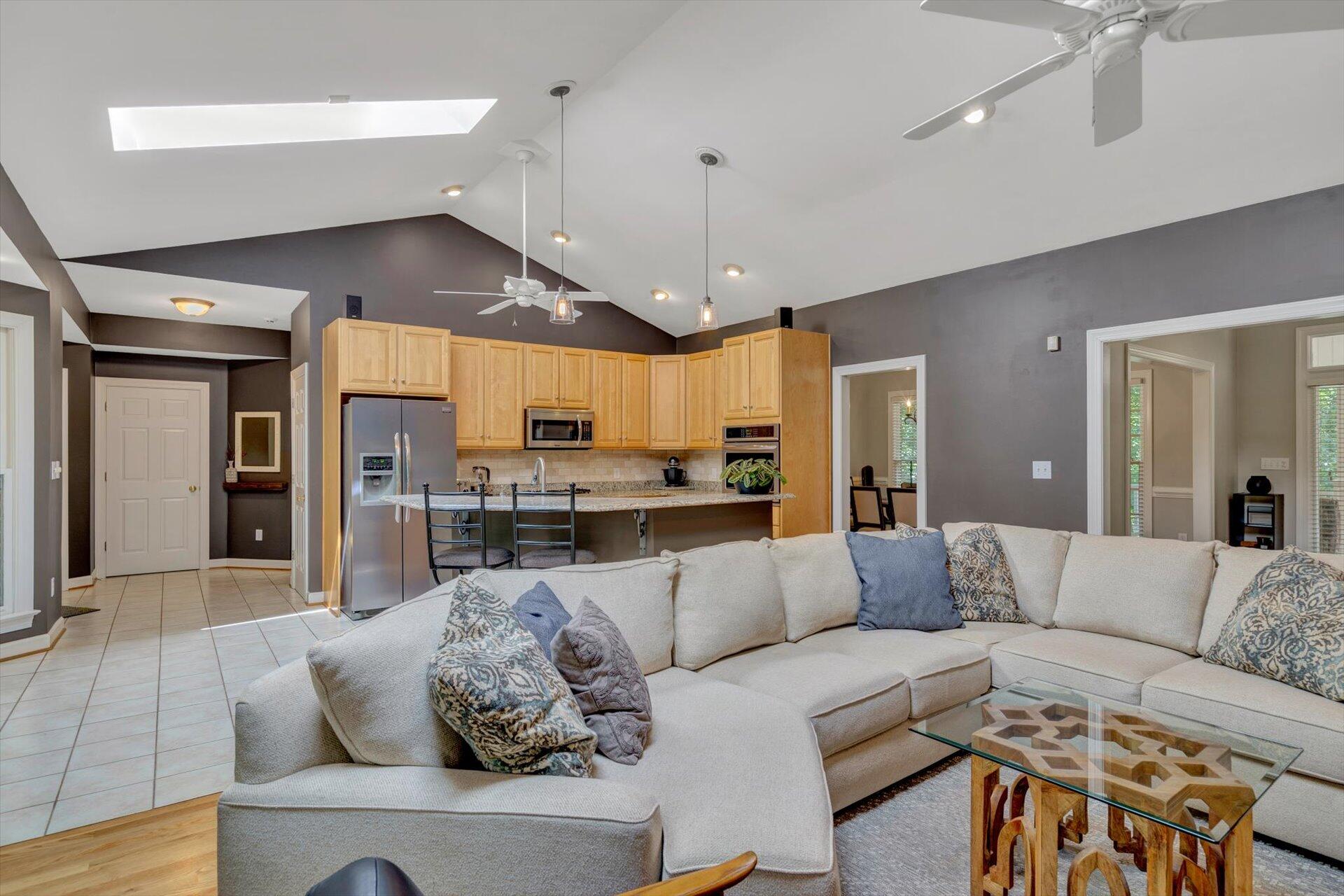 2795 New Ridge Road Elliston, VA 24087 - Photo 13 of 46 a living room with furniture kitchen view and a chandelier