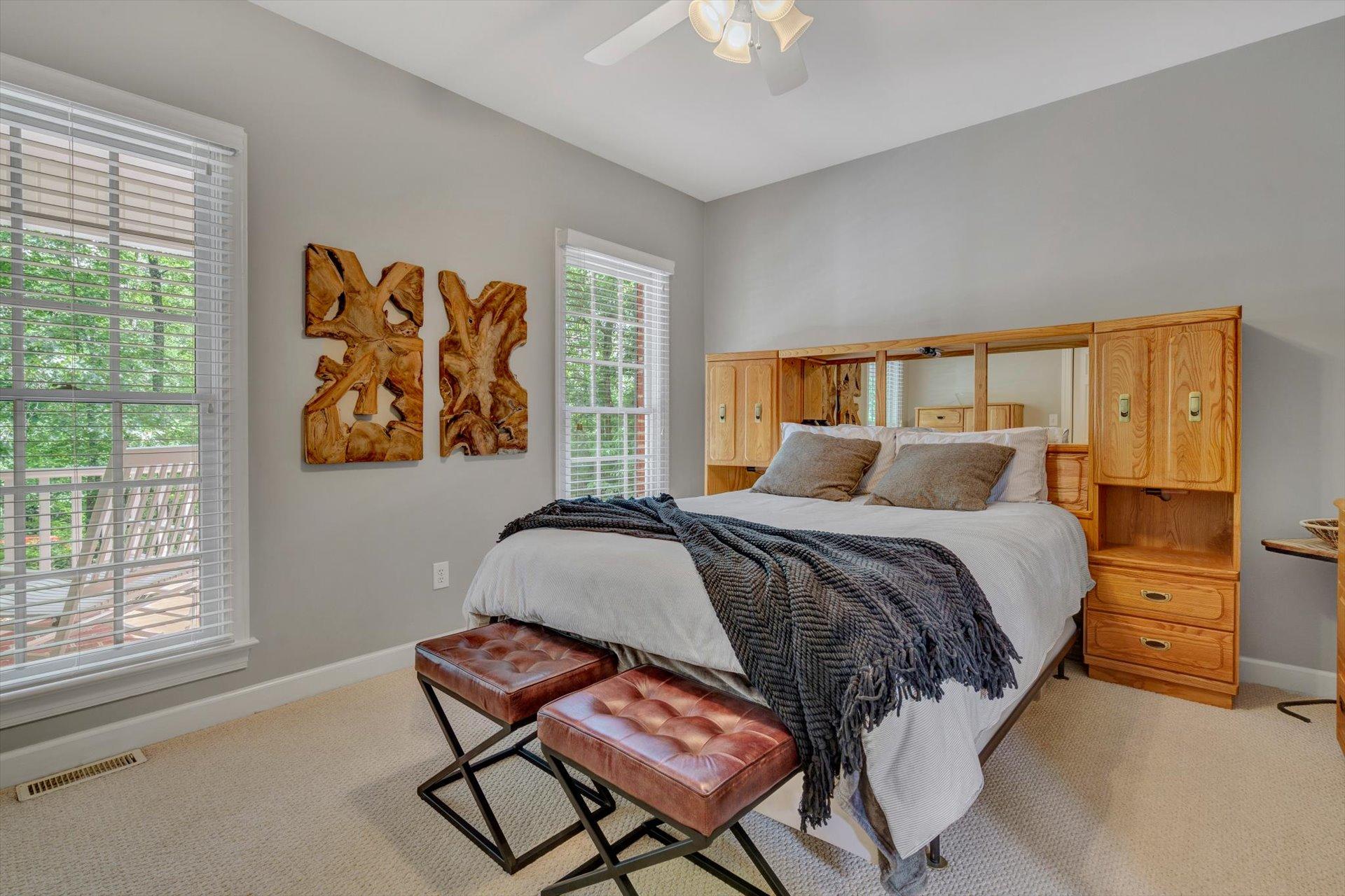 2795 New Ridge Road Elliston, VA 24087 - Photo 29 of 46 a bedroom with a bed and wooden floor