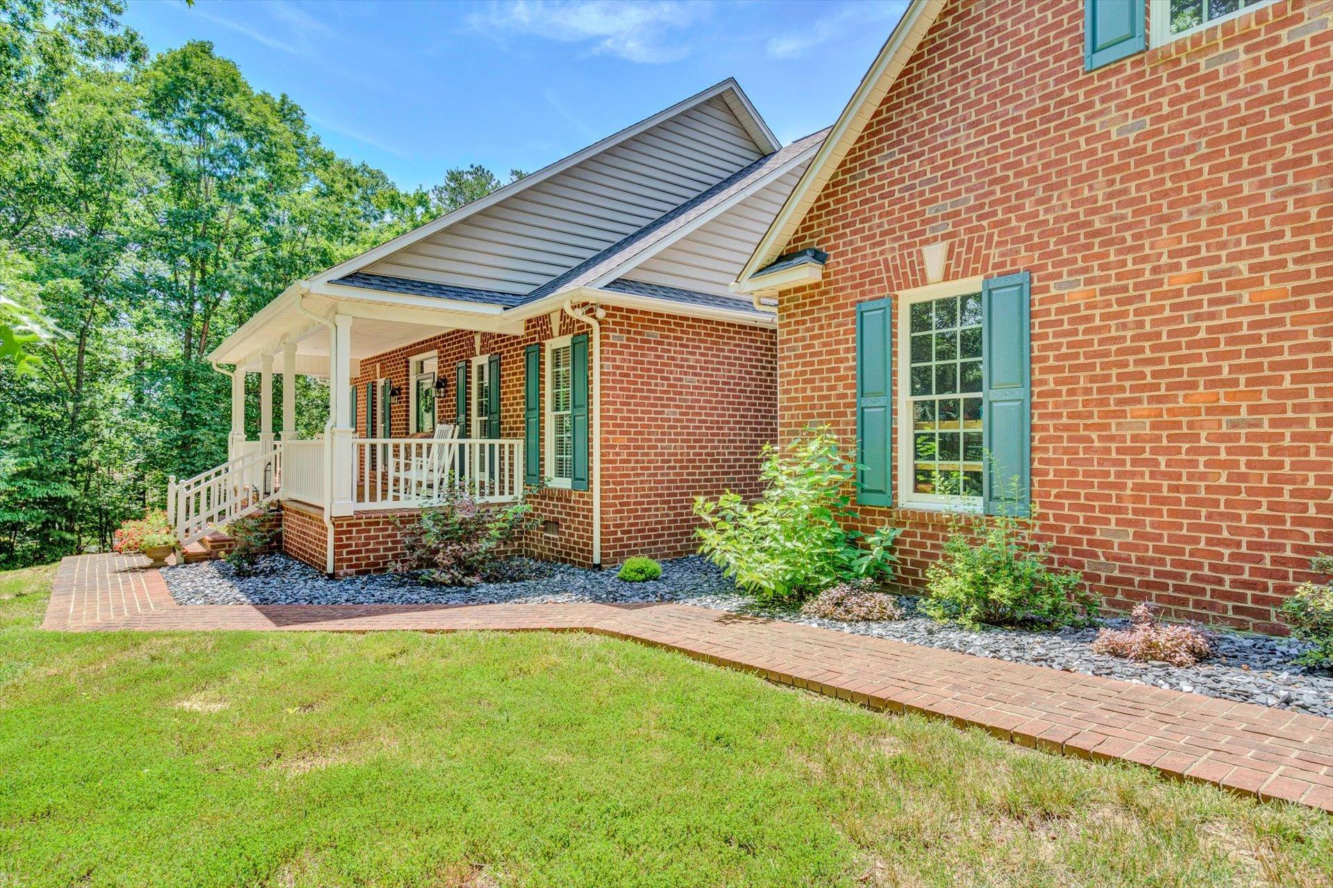 2795 New Ridge Road Elliston, VA 24087 - Photo 4 of 46 a view of a house with garden and yard