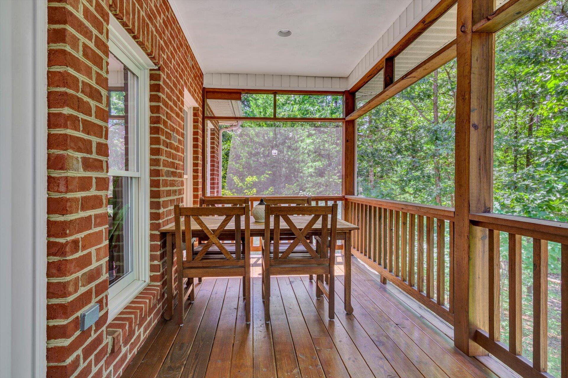 2795 New Ridge Road Elliston, VA 24087 - Photo 35 of 46 a view of a balcony with chairs and wooden floor