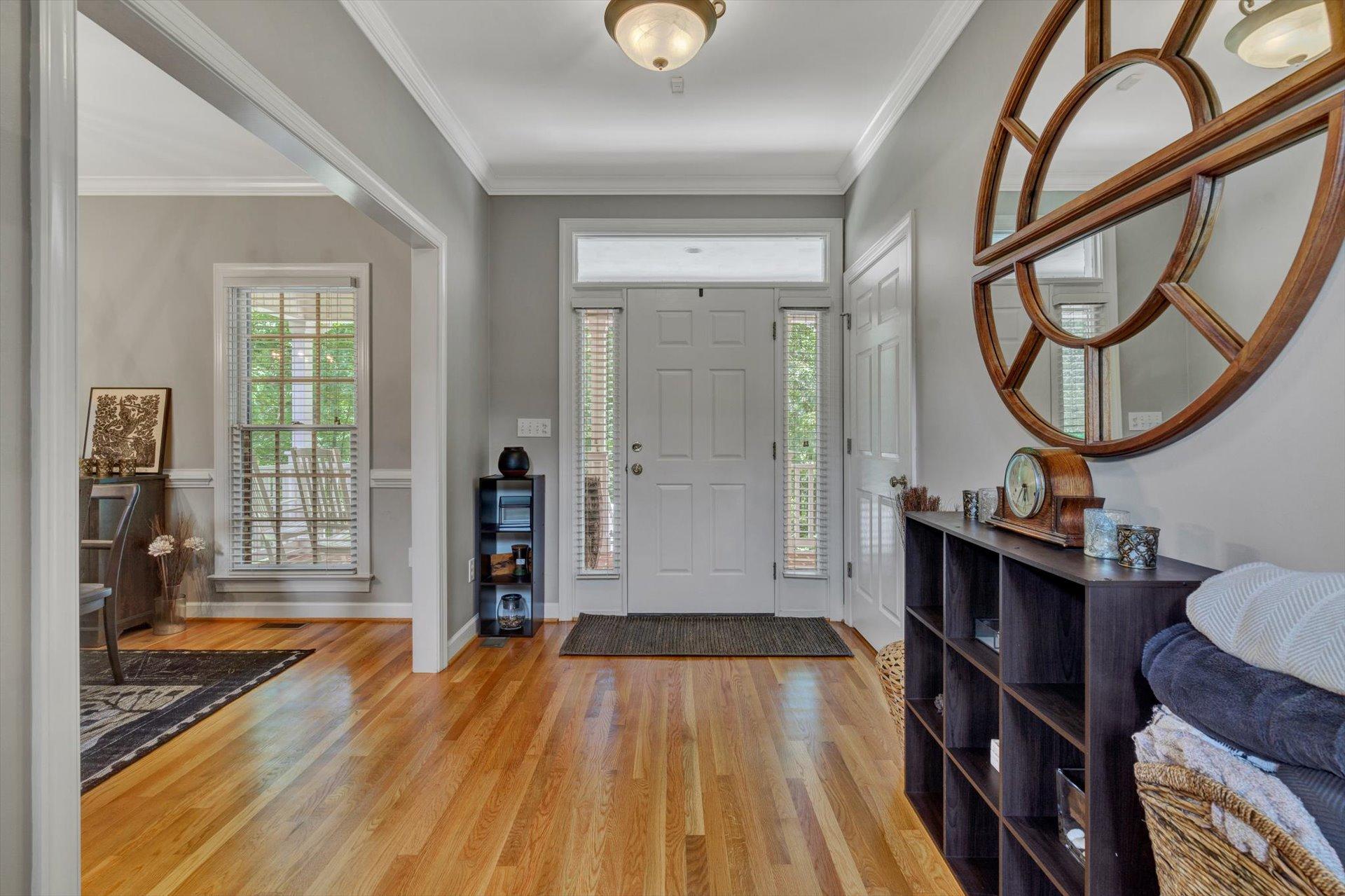 2795 New Ridge Road Elliston, VA 24087 - Photo 8 of 46 a living room with furniture a mirror and a table