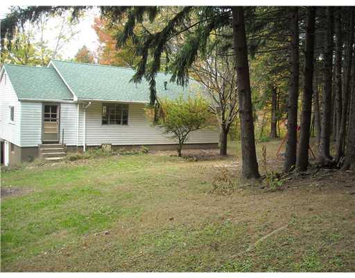 26 Monier Road Gibsonia, PA 15044 - Photo 13 of 15 Exterior Back. View of private, wooded back yard and rear exterior of home.