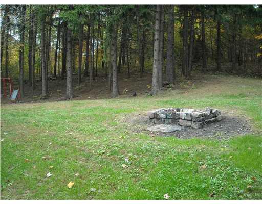 26 Monier Road Gibsonia, PA 15044 - Photo 14 of 15 Exterior Back. Firepit in back yard and view of some of the treed lot. This could be yours today!