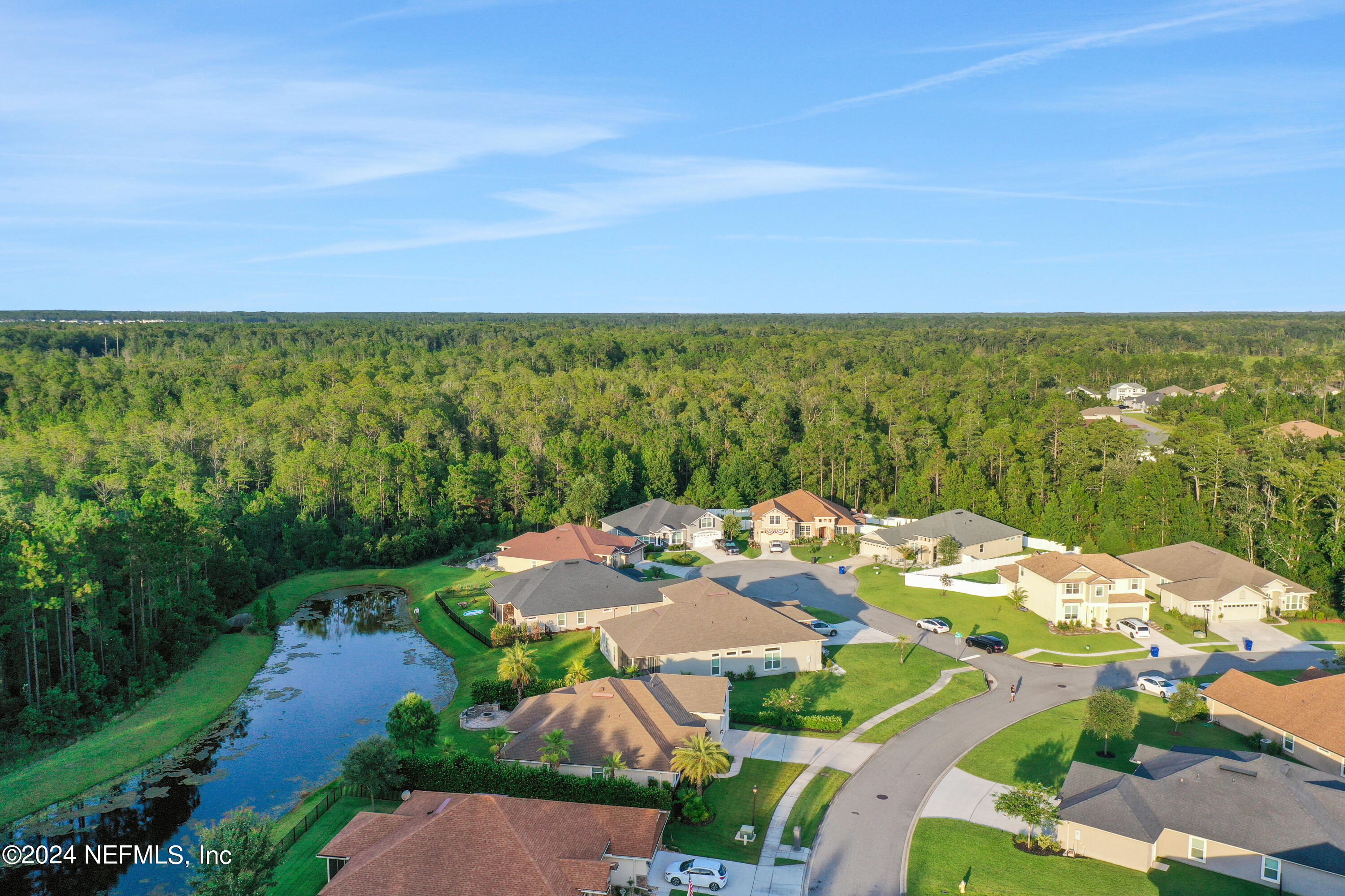 183 Flora Lake Circle St. Augustine, FL 32095 - Photo 11 of 40 a view of a city from a balcony