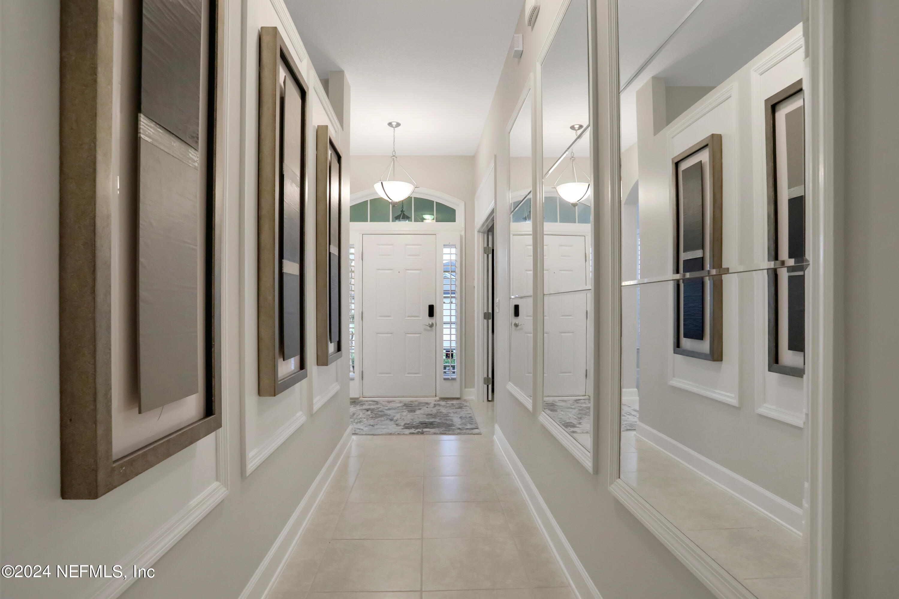183 Flora Lake Circle St. Augustine, FL 32095 - Photo 13 of 40 a view of a bathroom with a glass door