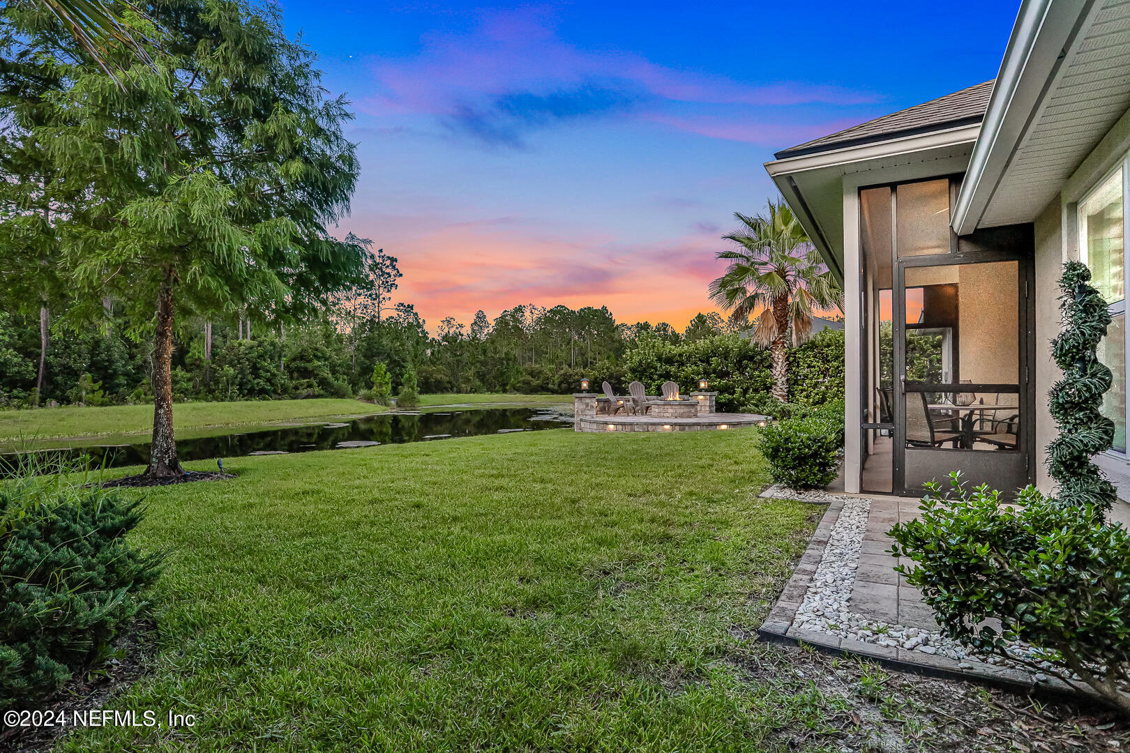 183 Flora Lake Circle St. Augustine, FL 32095 - Photo 6 of 40 a view of a house with a yard