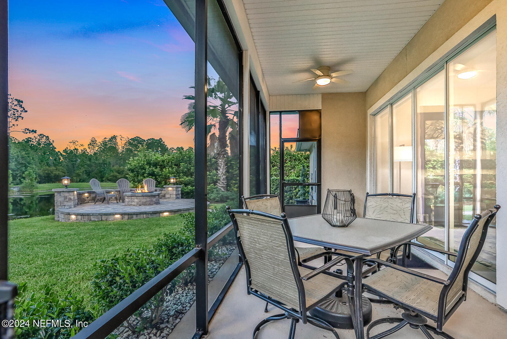 183 Flora Lake Circle St. Augustine, FL 32095 - Photo 7 of 40 a view of an outdoor dining space with a table and chairs