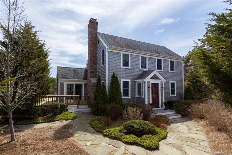 13 Snows Road Truro, MA 02666 - Photo 1 of 28 a front view of a house with garden