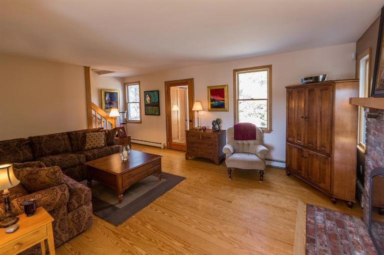13 Snows Road Truro, MA 02666 - Photo 11 of 28 a living room with furniture and a window