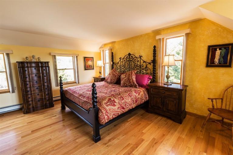 13 Snows Road Truro, MA 02666 - Photo 16 of 28 a bedroom with a bed dresser and a large window