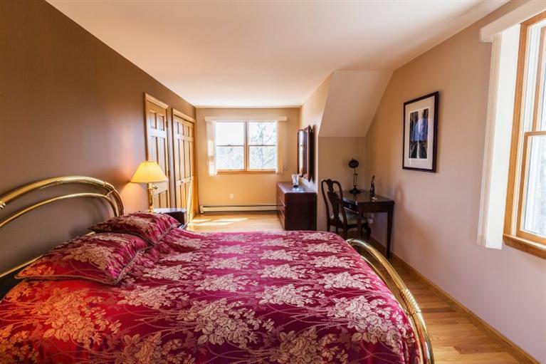 13 Snows Road Truro, MA 02666 - Photo 17 of 28 a bedroom with a large bed and a window
