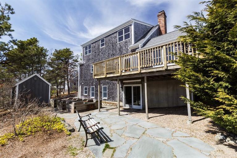 13 Snows Road Truro, MA 02666 - Photo 21 of 28 a front view of a house with patio