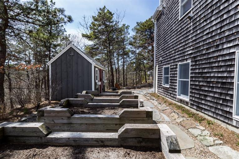 13 Snows Road Truro, MA 02666 - Photo 22 of 28 a view of a house with a patio
