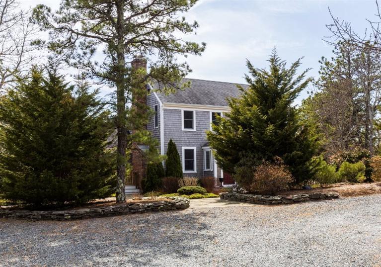13 Snows Road Truro, MA 02666 - Photo 26 of 28 a view of a house with a tree in front of it