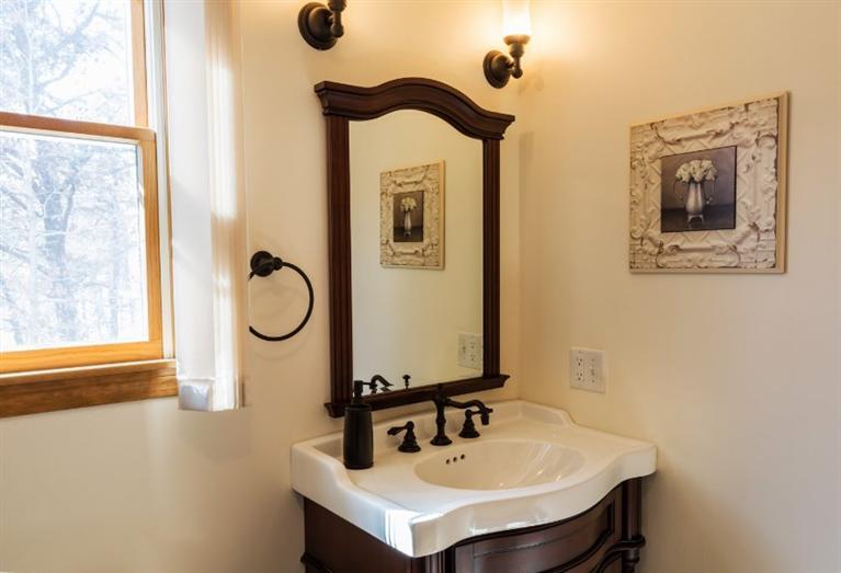 13 Snows Road Truro, MA 02666 - Photo 27 of 28 a bathroom with a sink and a mirror