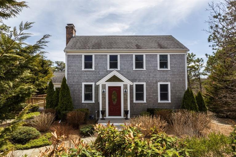 13 Snows Road Truro, MA 02666 - Photo 3 of 28 a front view of a house with a yard