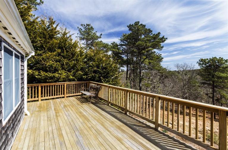 13 Snows Road Truro, MA 02666 - Photo 4 of 28 a view of balcony with wooden floor and fence