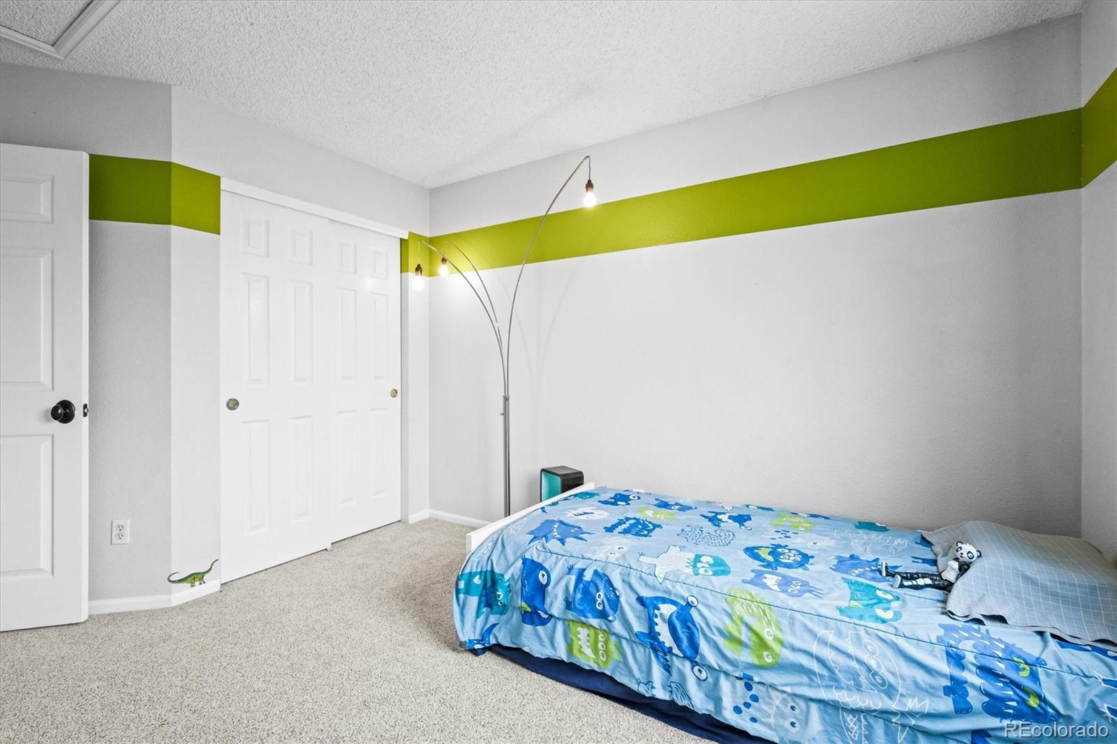 951 Timbervale Trail Highlands Ranch, CO 80129 - Photo 18 of 33 a bedroom with a bed and a window
