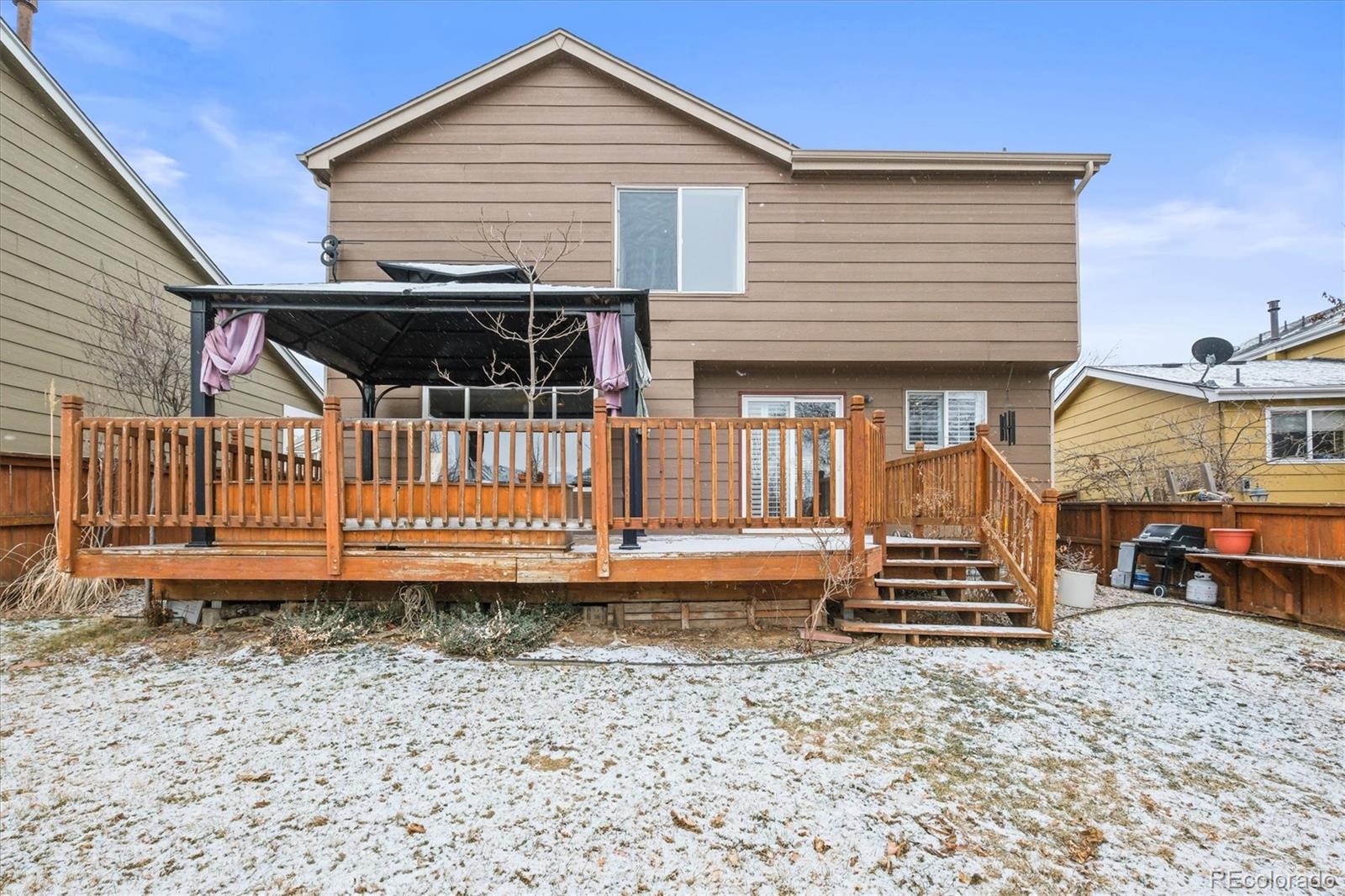 951 Timbervale Trail Highlands Ranch, CO 80129 - Photo 25 of 33 a front view of a house with garden