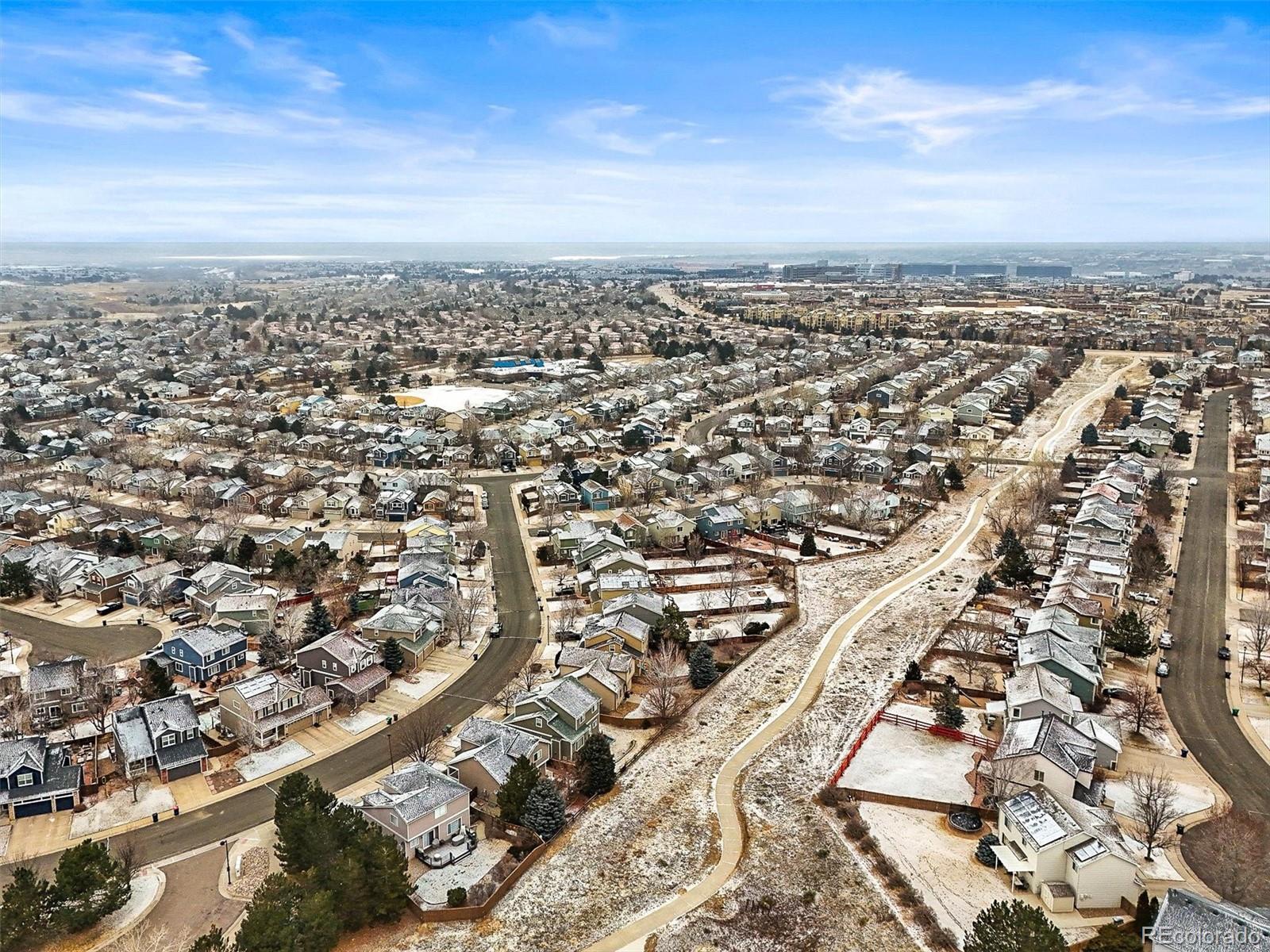 951 Timbervale Trail Highlands Ranch, CO 80129 - Photo 28 of 33 an aerial view of a city