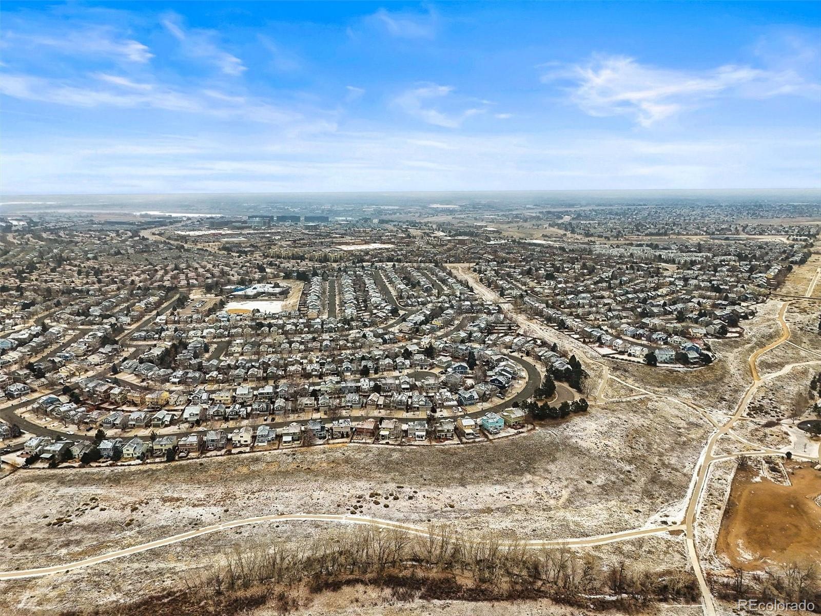 951 Timbervale Trail Highlands Ranch, CO 80129 - Photo 29 of 33 an aerial view of residential building and trees
