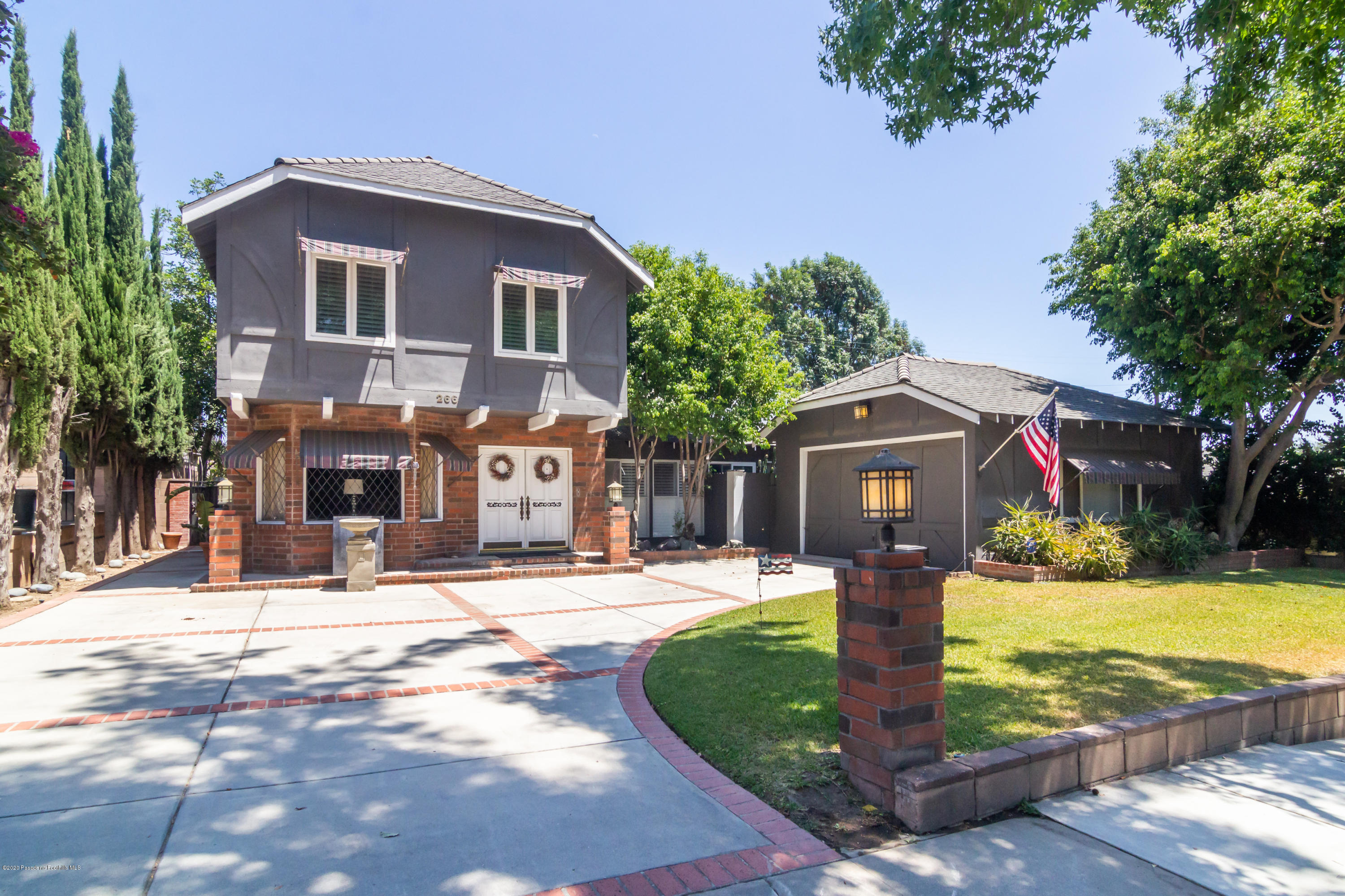 266 Melcanyon Road Duarte, CA 91010 - Photo 1 of 27 a front view of a house with yard porch and livingroom