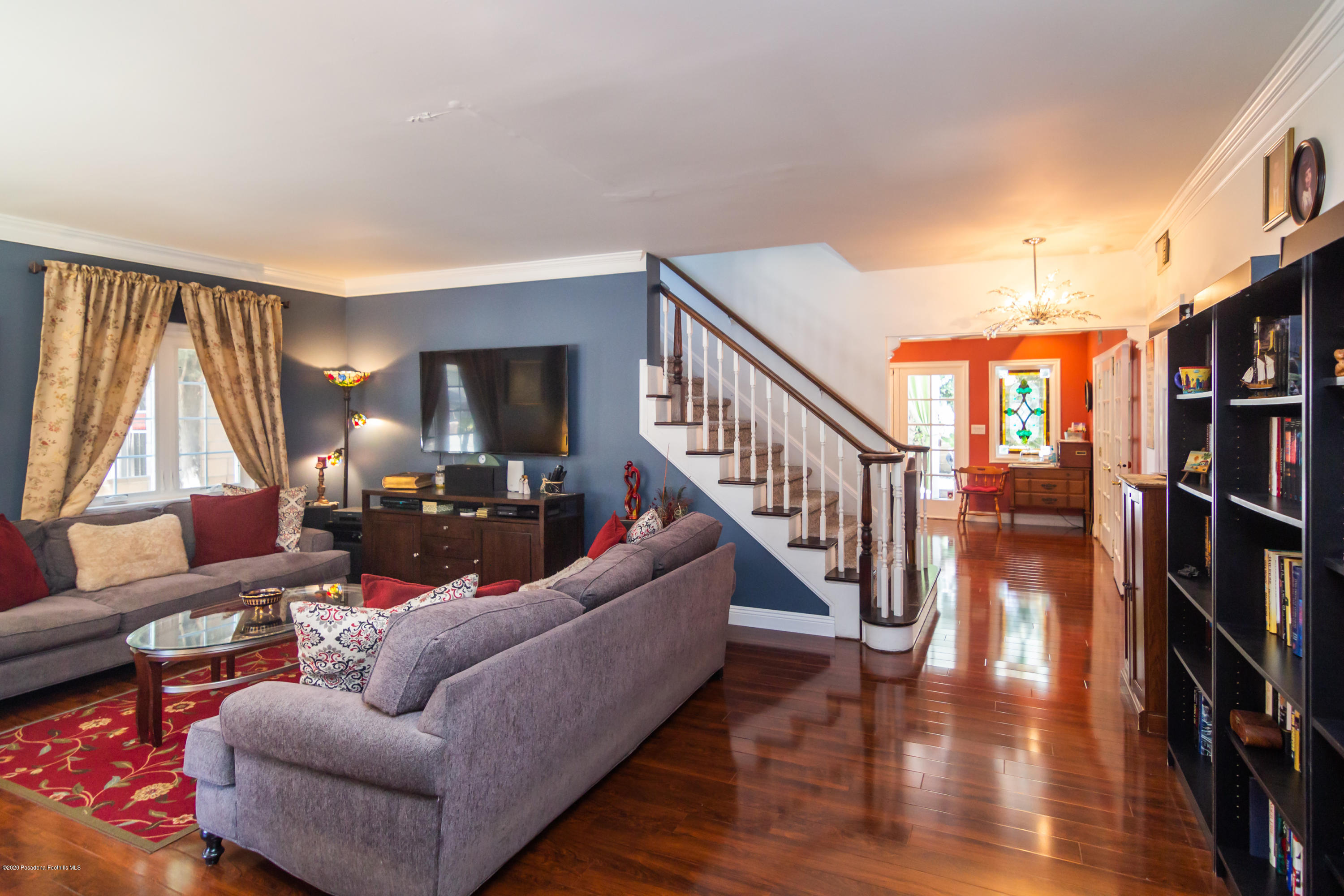 266 Melcanyon Road Duarte, CA 91010 - Photo 2 of 27 a living room with wooden floor and stairs