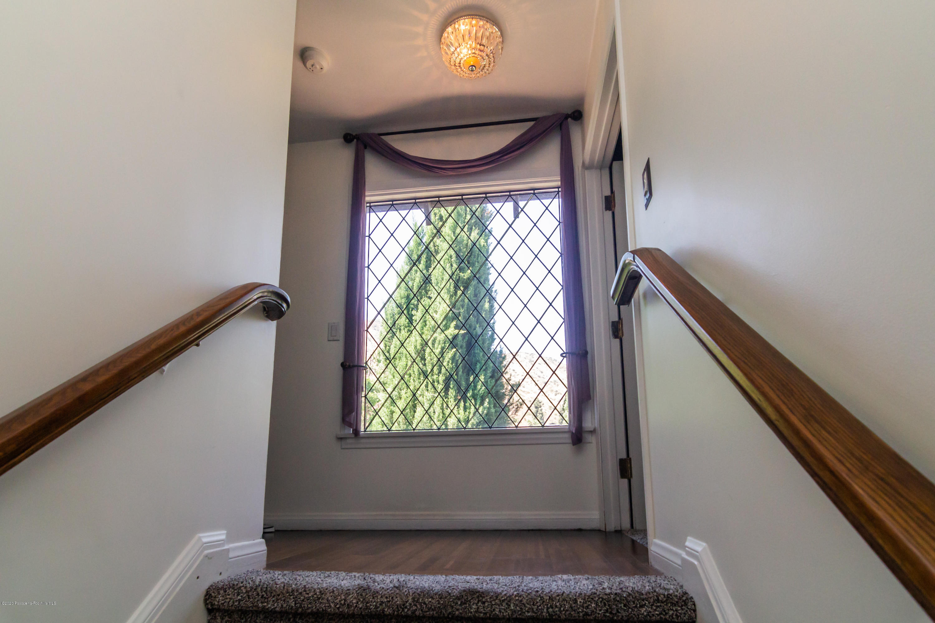 266 Melcanyon Road Duarte, CA 91010 - Photo 12 of 27 a view of entryway with a window and a rug