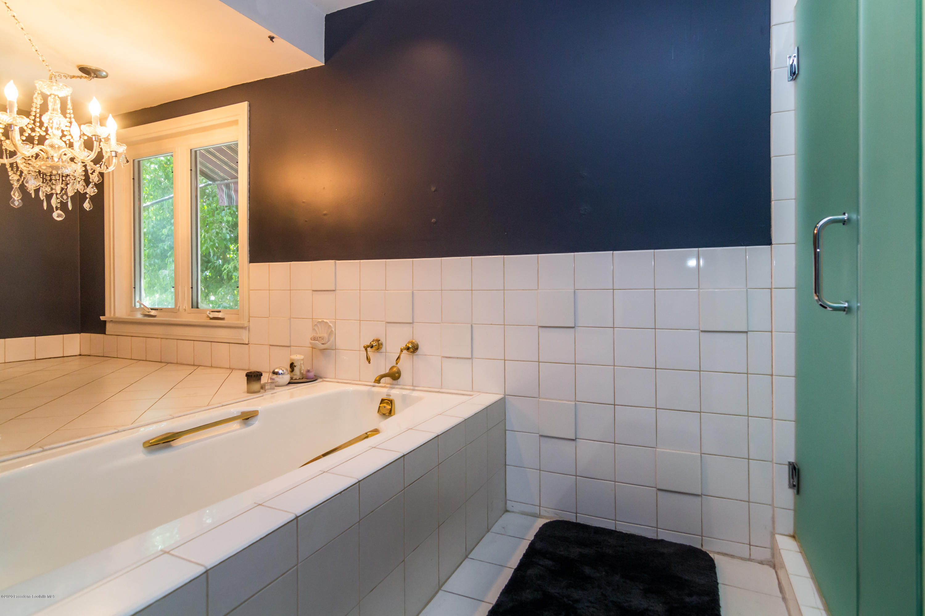 266 Melcanyon Road Duarte, CA 91010 - Photo 18 of 27 a bathroom with a bathtub and a sink