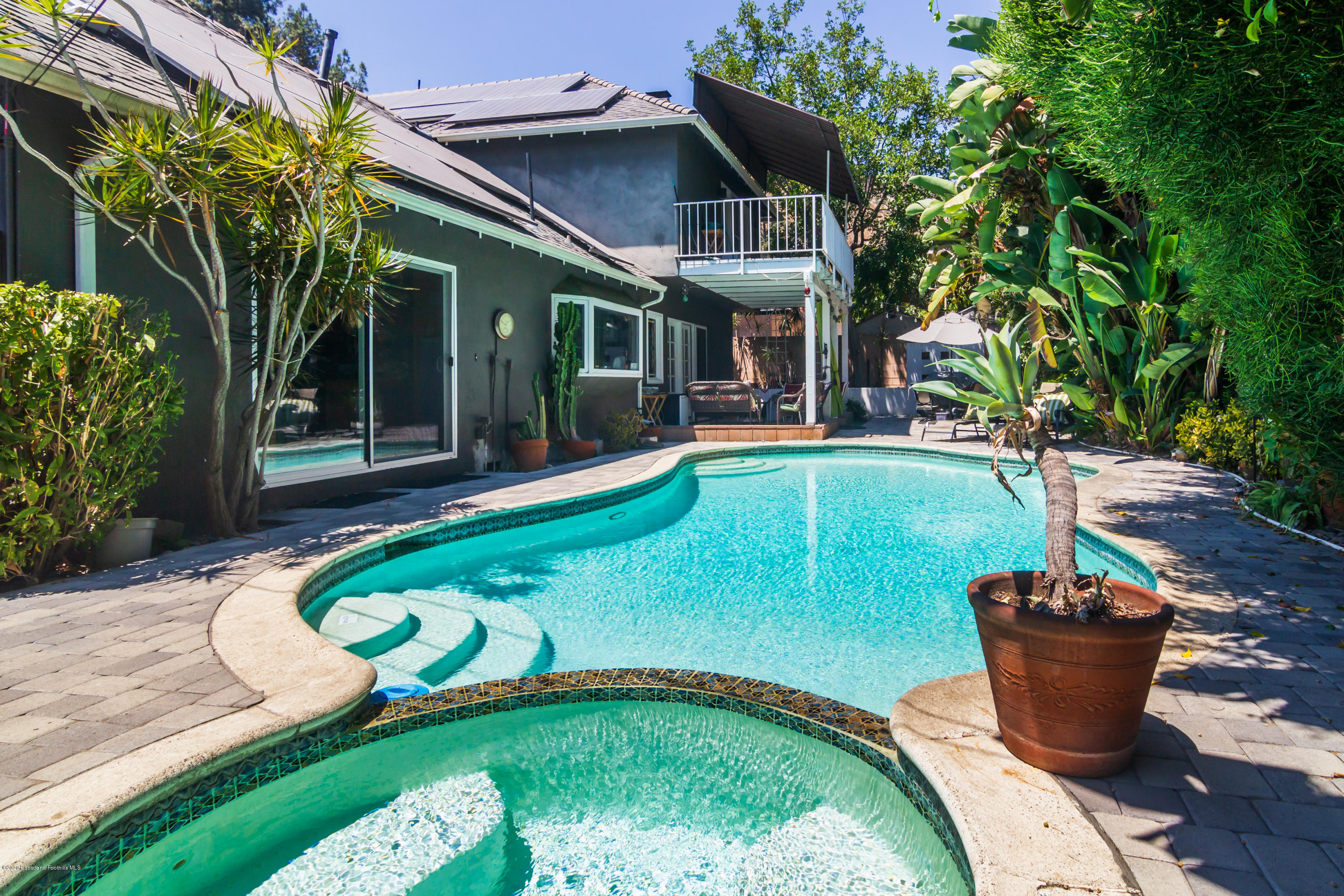266 Melcanyon Road Duarte, CA 91010 - Photo 25 of 27 a view of a house with backyard sitting area and swimming pool