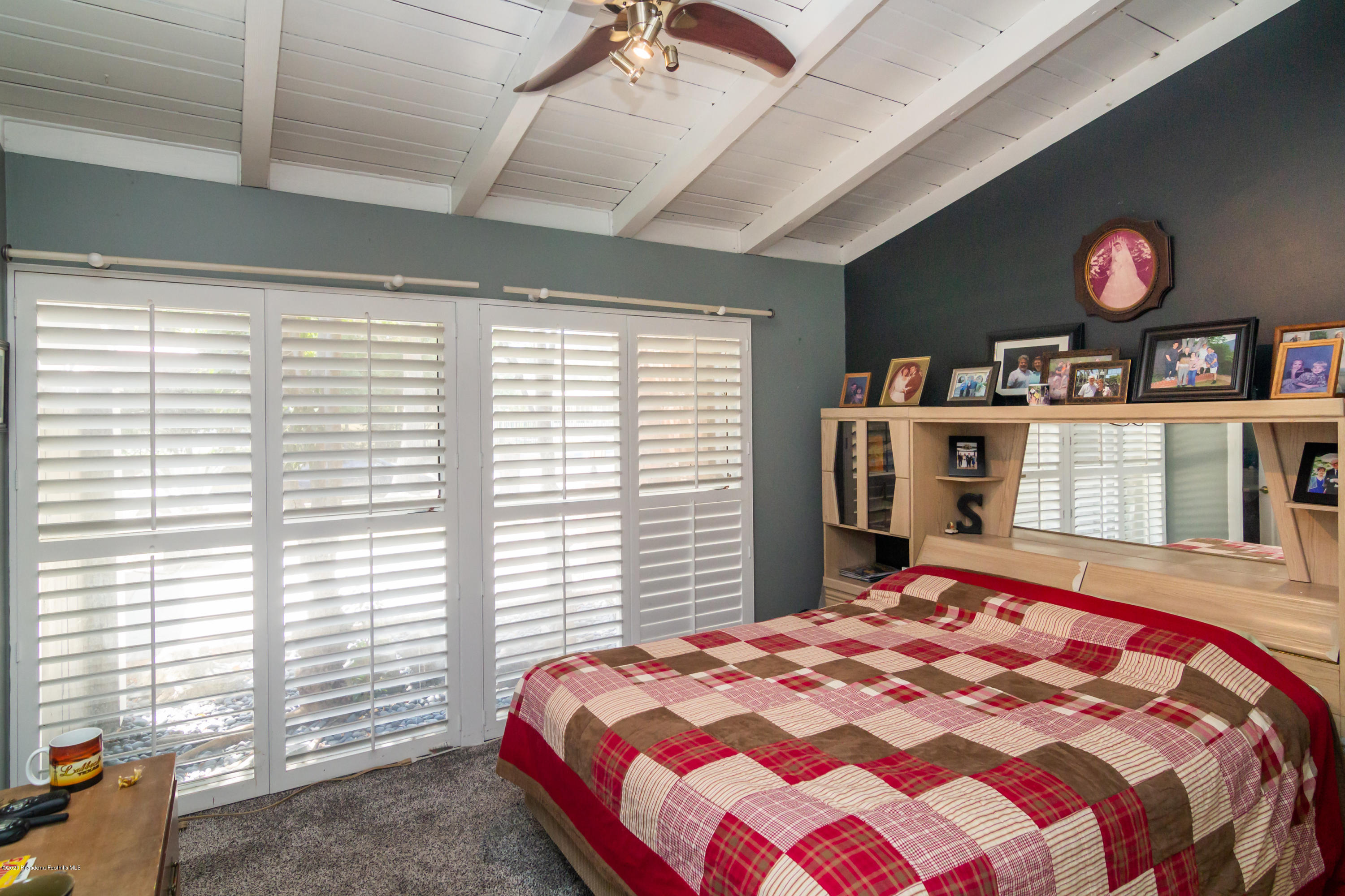 266 Melcanyon Road Duarte, CA 91010 - Photo 10 of 27 a bedroom with a bed and a large window