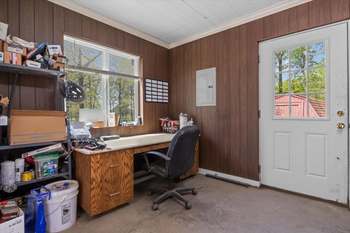 48 Hill Road Big Sandy, TN 38221 - Photo 36 of 54 a view of a workspace with furniture and a window