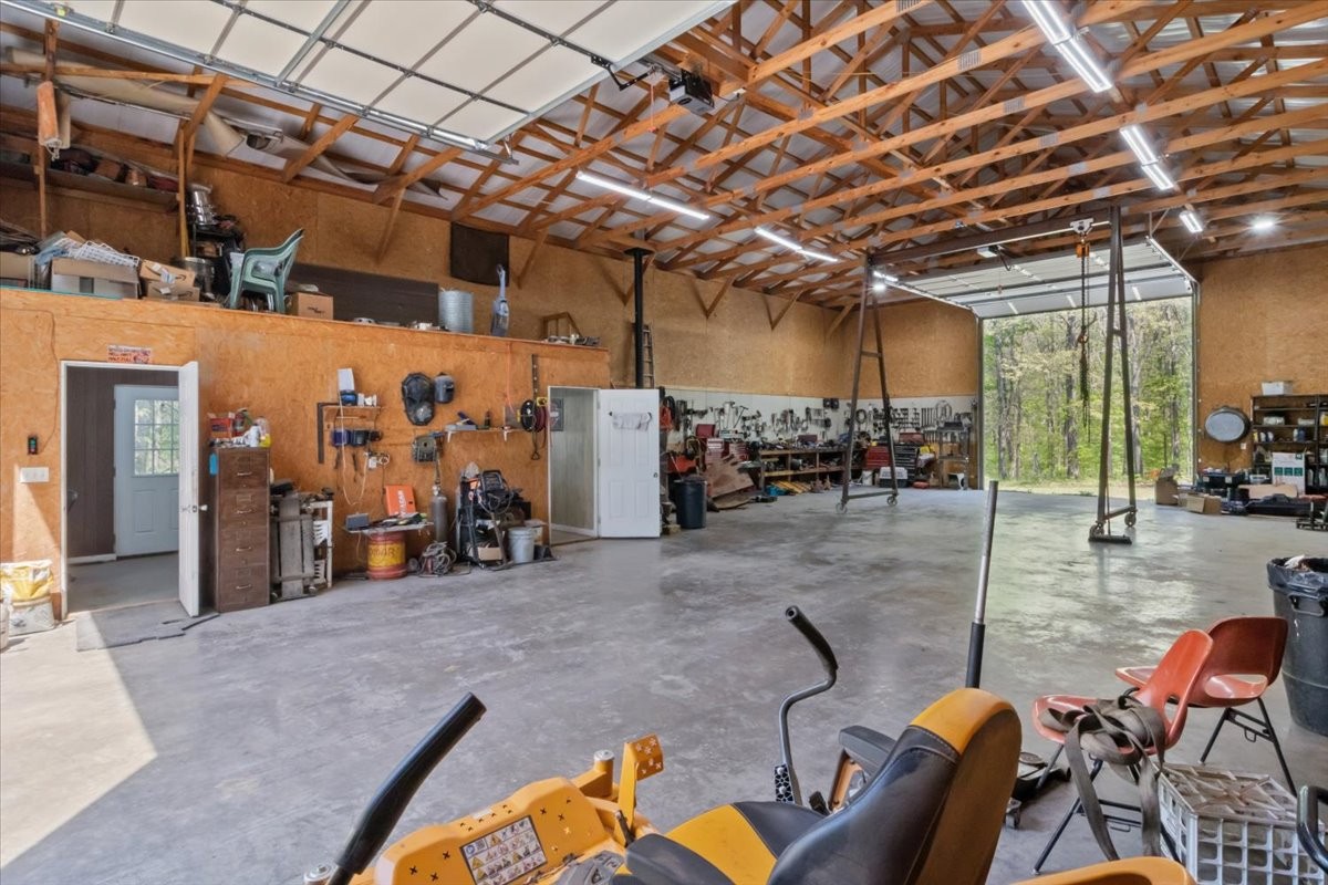 48 Hill Road Big Sandy, TN 38221 - Photo 38 of 54 a view of a room with gym equipment