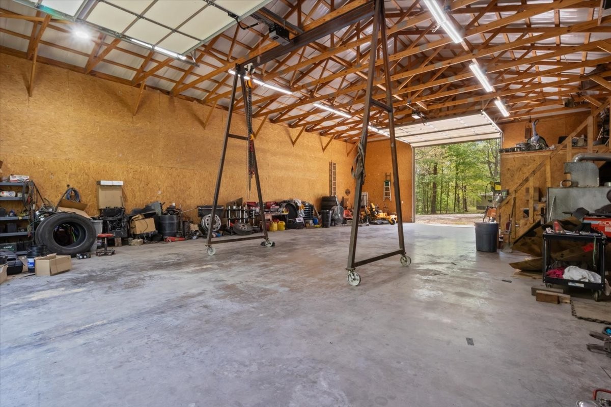 48 Hill Road Big Sandy, TN 38221 - Photo 39 of 54 a view of a room with gym equipment