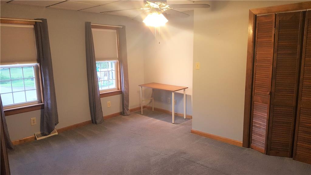 522 Winfield Road Cabot, PA 16023 - Photo 18 of 23 2nd bedroom with plenty of natural light. Shelving in closet.