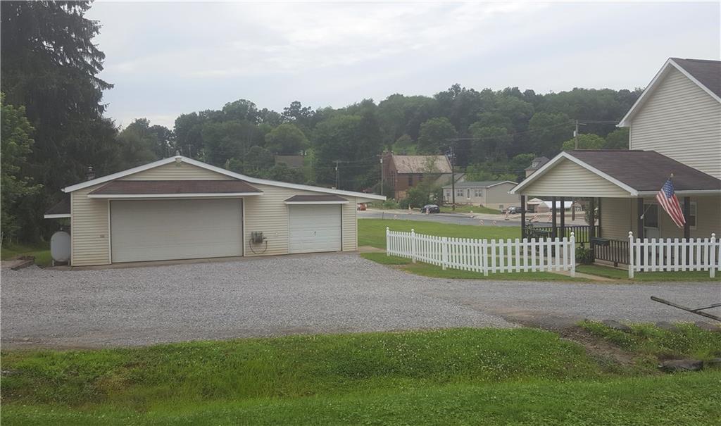 522 Winfield Road Cabot, PA 16023 - Photo 3 of 23 Detached garage with electric, heat and window A/C.