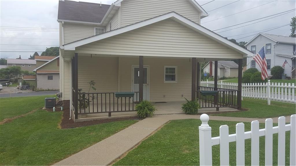522 Winfield Road Cabot, PA 16023 - Photo 5 of 23 Sidewalks from garage to back porch.