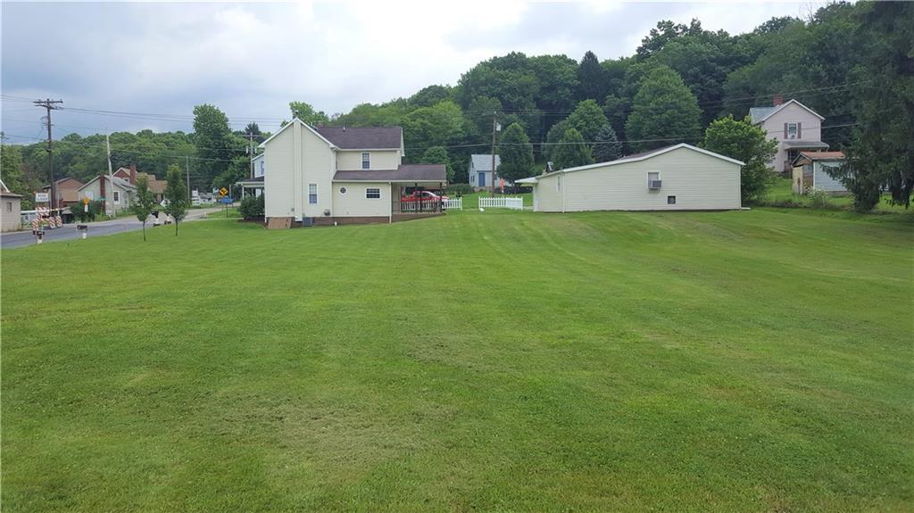 522 Winfield Road Cabot, PA 16023 - Photo 6 of 23 Big , level side yard for the kids to play.