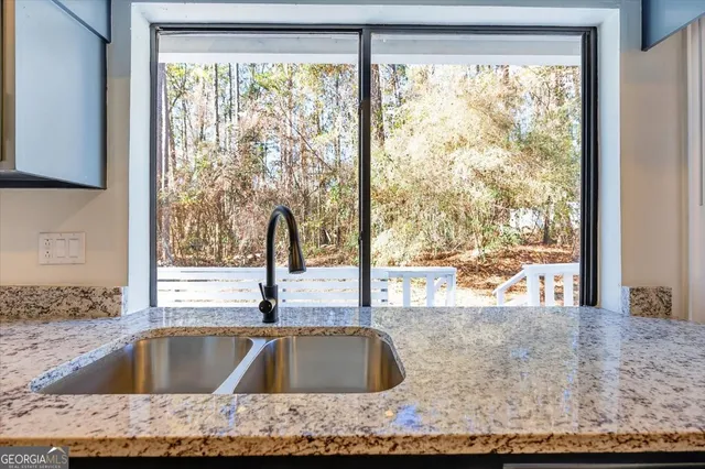 a view of a kitchen counter and a sink