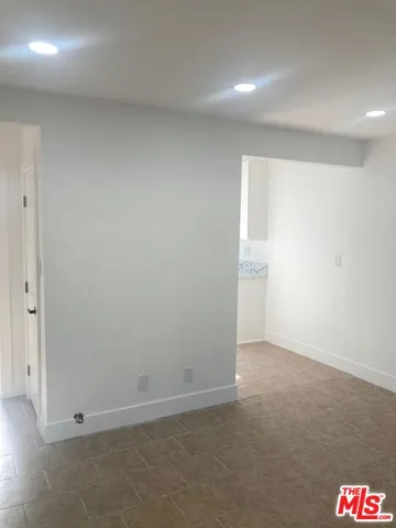 an empty room with an entryway